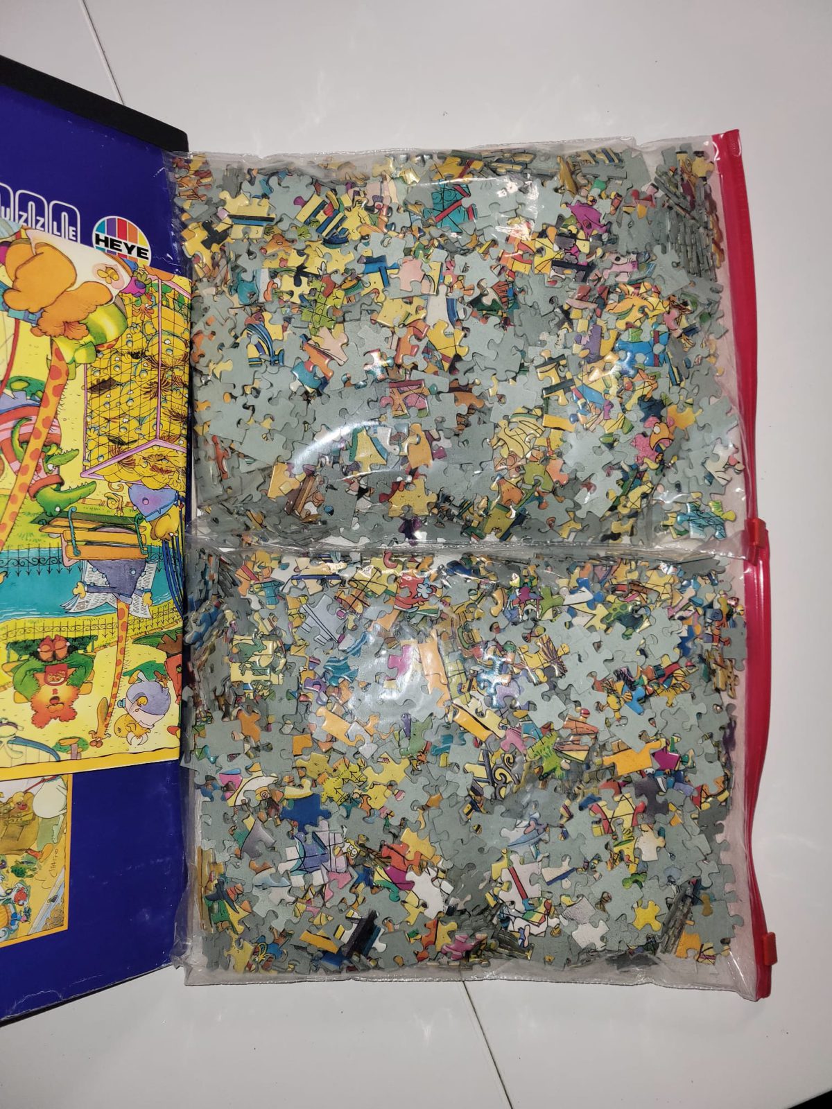 Image of the puzzle 2000, Heye, Human Zoo, by Matt, Complete, Picture of the bag