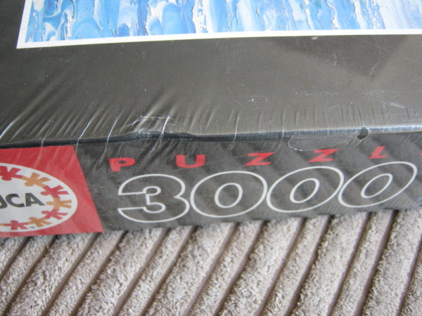 Image of the puzzle 3000, Educa, Lake Como Landing, by Howard Behrens, Factory Sealed, Detail of the box