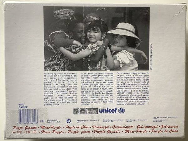 Image of the puzzle 1436-0.7-1000, Unicef, Evening Landscape with Haycocks and Rising Moon, Saint-Rémy, by Vincent van Gogh, Factory Sealed, Picture of the back