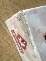 Image of the puzzle 1500, Art Puzzle, Cheers to Love, by Charles Delort, Factory Sealed, Picture of the corner