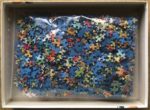 Image of the puzzle 1000, Ravensburger, Floral Mushroom Houses, by Hanna Karlzon, Complete, Picture of the bag