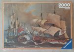 Image of the puzzle 2000, Ravensburger, Naval Battle, Ángel Cortellini, Factory Sealed, Picture of the box