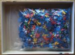 Image of the puzzle 1000, Ravensburger, Peanuts Moments, by Charles Schulz, Complete, Picture of the bag