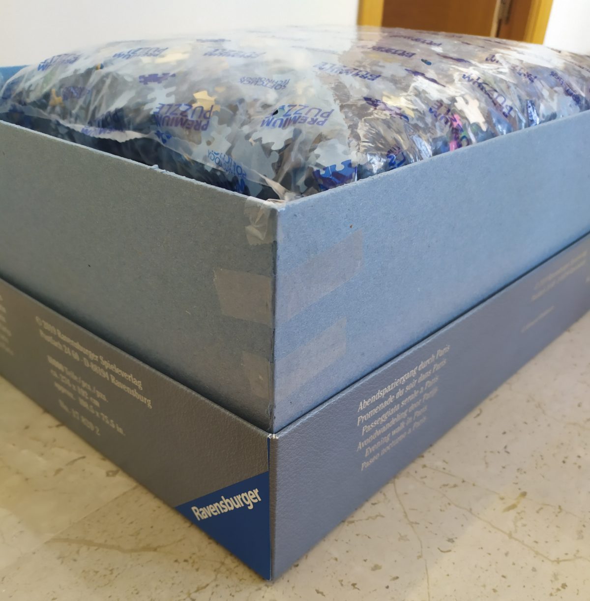 Image of the puzzle 18000, Ravensburger, Evening Walk in Paris, by Howard Robinson, Sealed Bag, Picture of the box