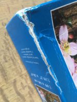 Image of the puzzle 1000, Jumbo, Cat in Blossom, Sealed Bag, Picture of the corner