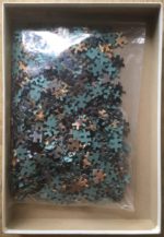 Image of the puzzle 1000, Hestair, Les Parapluies, by Pierre-Auguste Renoir, Incomplete, Picture of the bag