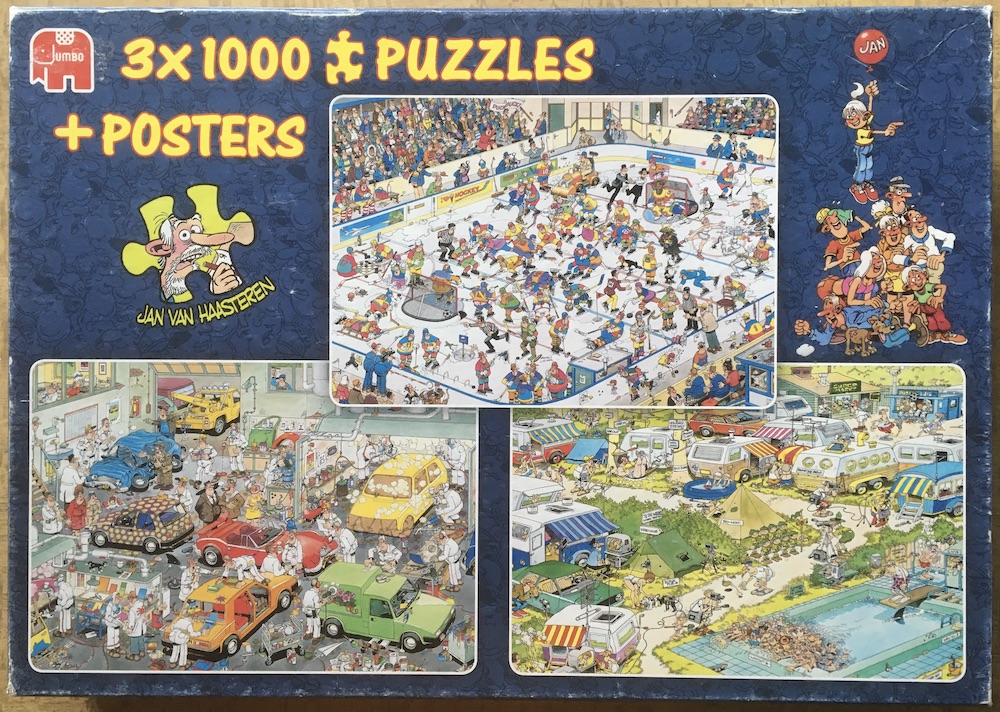 3x1000, Jumbo, Ice Hockey & In the Car Respraying Shop & Camping Chaos, by Jan van Haasteren, Complete, 2025-08-12 Image of the puzzle 3x1000, Jumbo, Ice Hockey & In the Car Respraying Shop & Camping Chaos, by Jan van Haasteren, Complete, Picture of the box