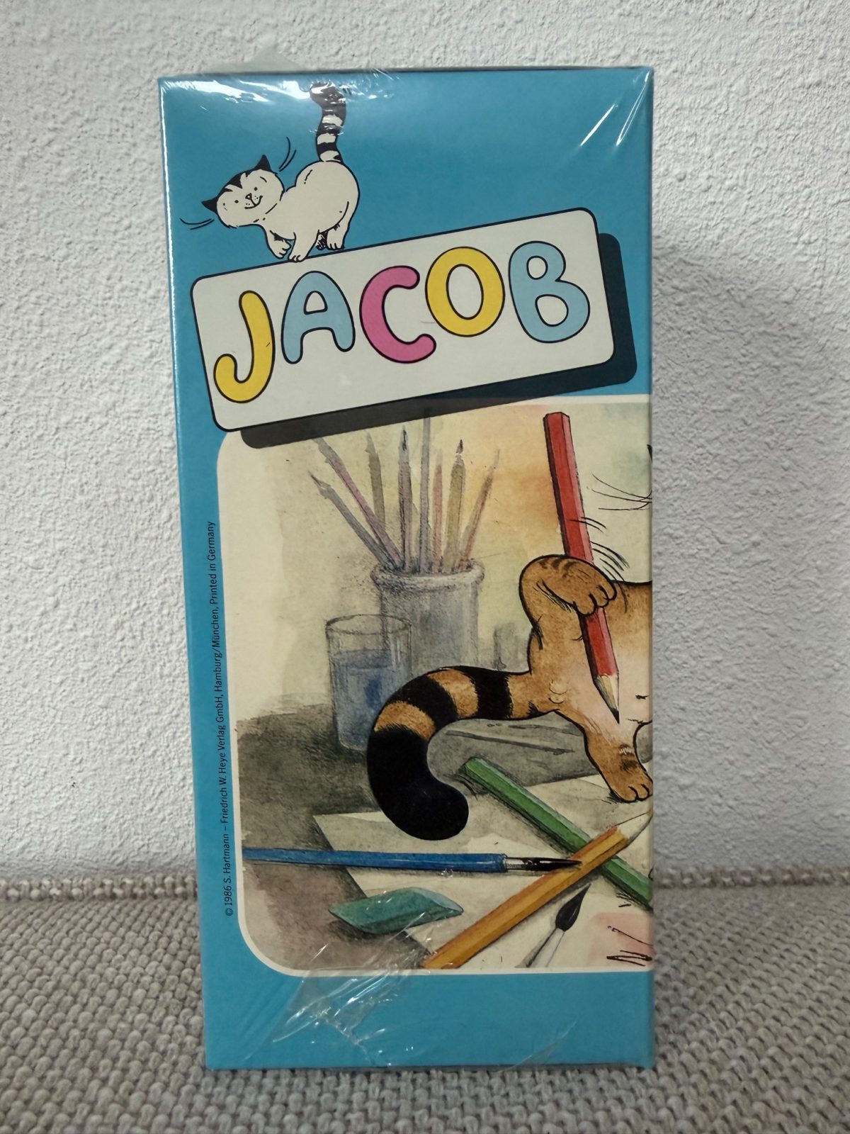 Image of the puzzle 300, Heye, Jacob (8244), by Hartmann, Factory Sealed, Picture of the Box