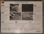 Image of the puzzle 1000, MB, Donna Velata, by Richard Franklin, Complete, Picture of the Back of the Base